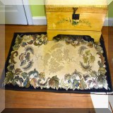 D72. Hand hooked rug. Damage to one corner. 34” x 66” - $25 